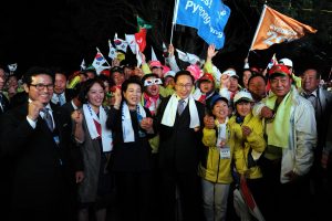 President Lee Myung-bak, members of the PyeongChang Bidding Committee and with a delegation of Pyeongchang residents cheer as Pyeongchang was selected as the Games' host at the IOC general assembly in Durban, South Africa. Pyeongchang will host the 2018 Winter Olympics after beating Munich and Annecy as the IOC vote results are announced in Durban. Korea.net / Korean Culture and Information Service [CC BY-SA 2.0 (http://creativecommons.org/licenses/by-sa/2.0)], via Wikimedia Commons