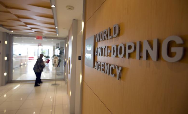 A woman walks into the head office for the World Anti-Doping Agency (WADA) in Montreal, Quebec, Canada on November 9, 2015.  Photo: REUTERS/Christinne Muschi/File Photo