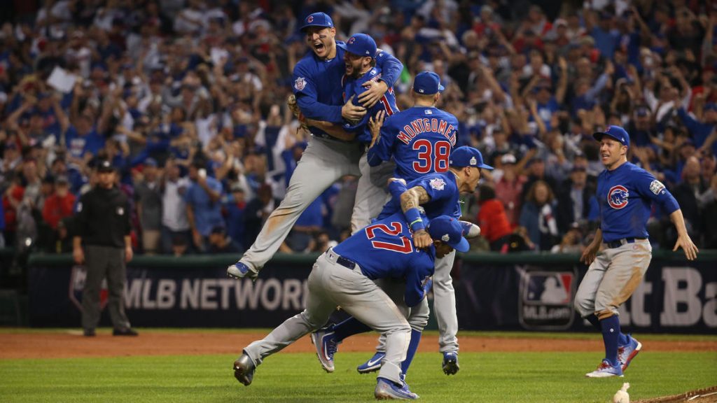 The Chicago Cubs celebrate after defeating the Cleveland Indians in Game 7 of the 2016 World Series on Wednesday. Photo: Chicago Tribune