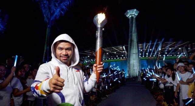 Boxing Stars Light Southeast Asian Games Cauldron in Opening Ceremony
